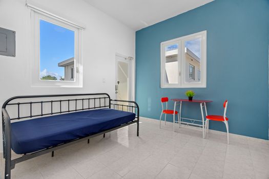 Our multi-functional living area seamlessly blends comfort with utility, featuring a cozy sofa (or sofa bed) where you can read, lounge, or simply enjoy a quiet evening.