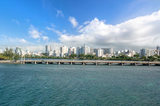 Immerse yourself in stunning waterfront views! Enjoy the vibrant San Juan skyline & serene Condado Lagoon from your doorstep