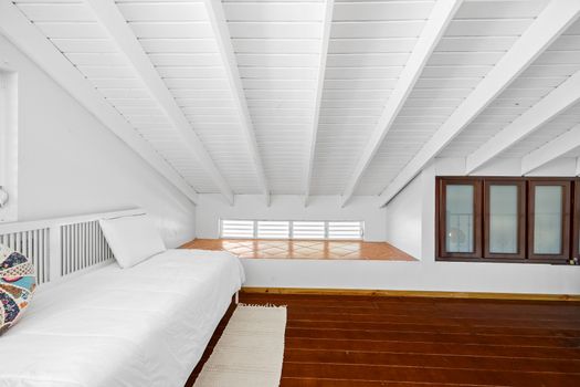 Spacious loft with warm wood floors. A bright, open space perfect for unwinding or stretching out after island adventures.