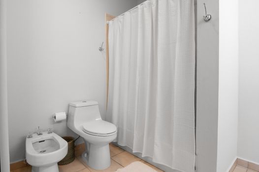 Our pristine bathroom provides a bright and private space for your daily routine, designed for convenience.