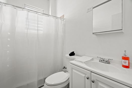 Spotless bathroom with hot water
