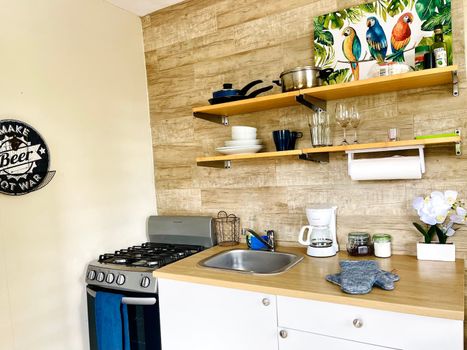 Everything you need for a quick bite or a gourmet meal: Find all your essential dishes, glassware, and utensils neatly organized.