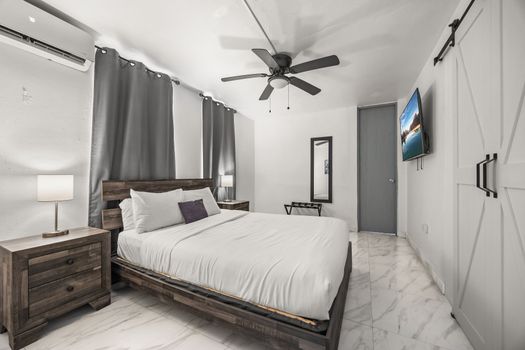 Stylish details like the sliding barn door.
