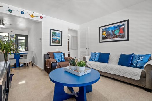 Coastal Comfort: Experience the laid-back luxury of our main living space, tastefully decorated to reflect the beauty of the sea.