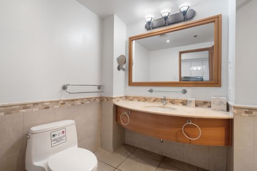 Modern & well-appointed, our bathroom provides a refreshing space to prepare for your day or wind down.