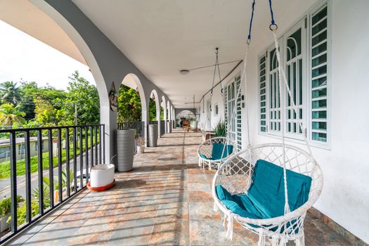 Enjoy the fresh air and lush surroundings from your private balcony.