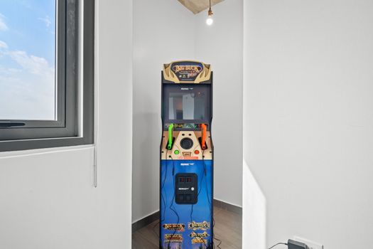 Add a touch of fun to your stay with our classic arcade game—nostalgia included!