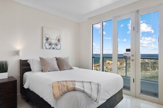 Bright and airy, this room offers the perfect blend of comfort and style, complete with captivating ocean vistas.