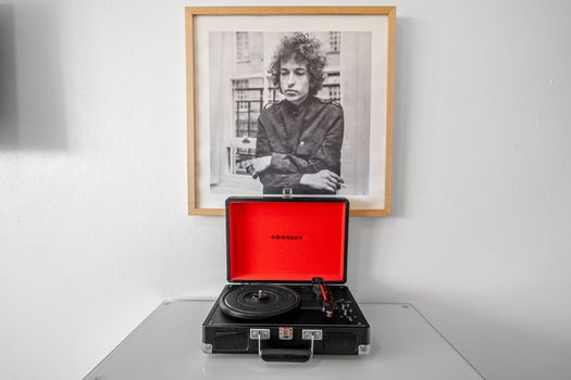 Relive the golden era of music with our vintage-inspired setup, featuring a classic record player.