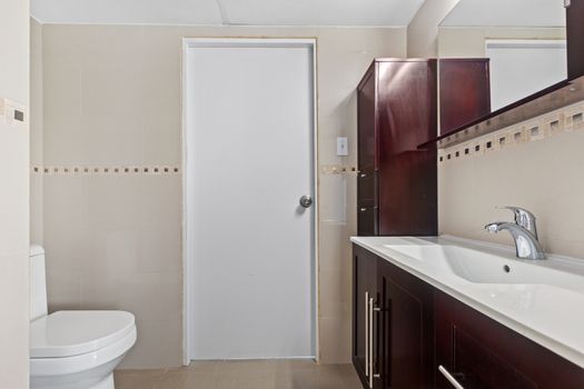 Modern cabinet sink design, showcasing a sleek, minimalist vanity with integrated storage.