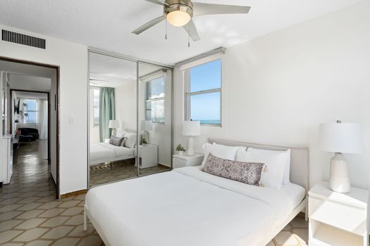 Your private sanctuary. This inviting bedroom offers a serene space to relax and recharge, with ample room and comfortable furnishings designed for your ultimate comfort.