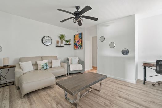 Inviting living area with stylish decor and comfortable seating.