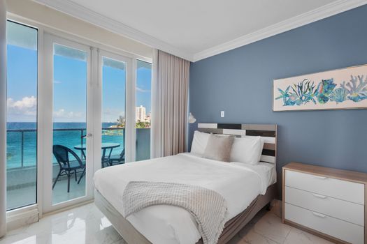 Light-filled room with relaxing beach tones