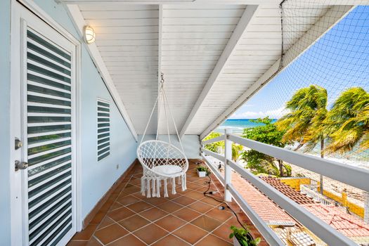 beachfront balcony with hammock