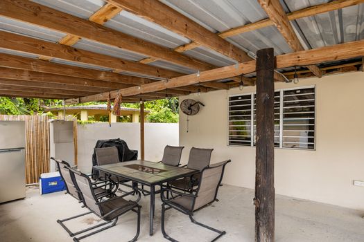 Private covered area next to the refreshing pool.