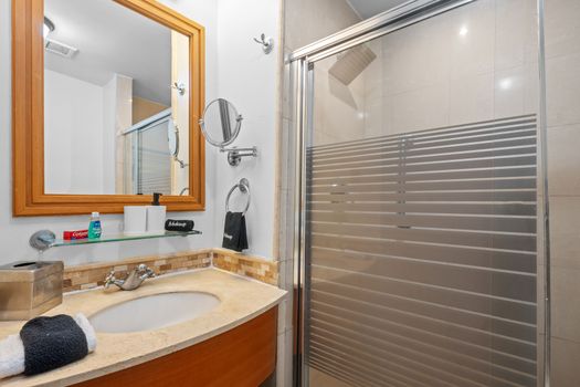 Your private spa moment. Step into this inviting shower space, designed for comfort and ease, offering a clean and modern environment for your personal care.