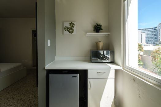 Enjoy the convenience of your personal kitchenette, complete with a mini-fridge and microwave – perfect for quick snacks, beverages, and simple meals during your stay.
