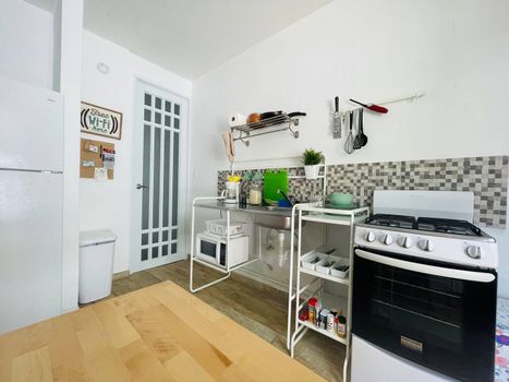 Unleash your inner chef in our fully equipped kitchen! Complete with a stove, pans, cutlery, utensils, and a microwave, you'll have everything you need to prepare delicious meals.