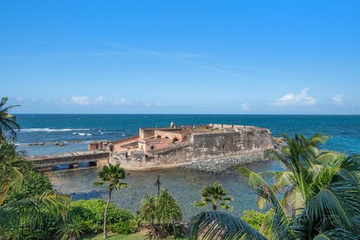 Discover history and beauty! This view captures the iconic Fort San Gerónimo against the endless blue of the ocean.