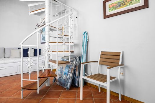 Charming spiral staircase. A fun architectural feature connecting your tropical home base.