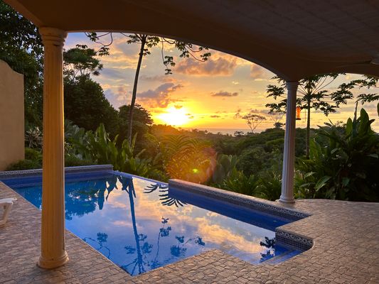 Beautiful sunset views from the private swimming pool patio.