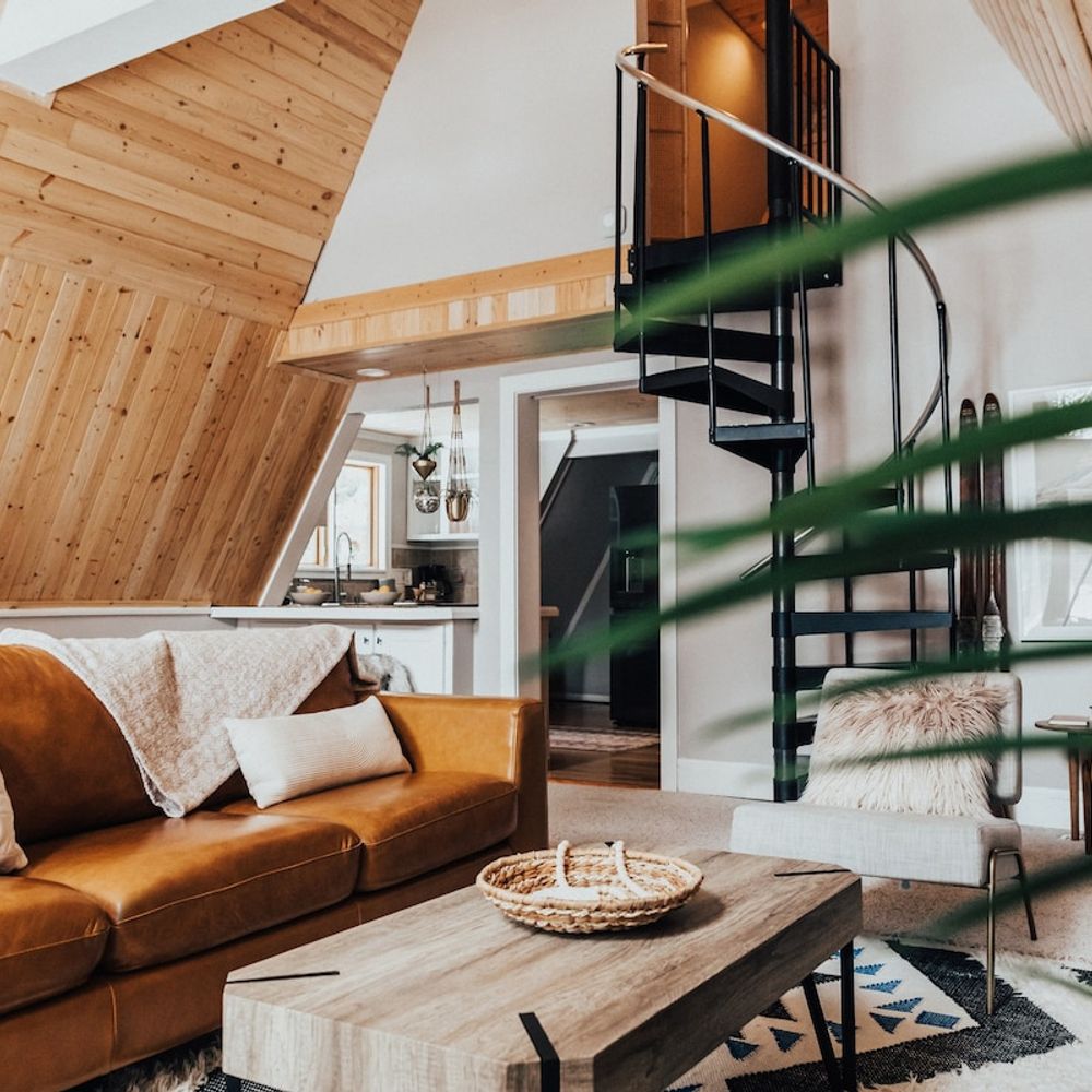 View of spiral staircase up to secondary bedroom