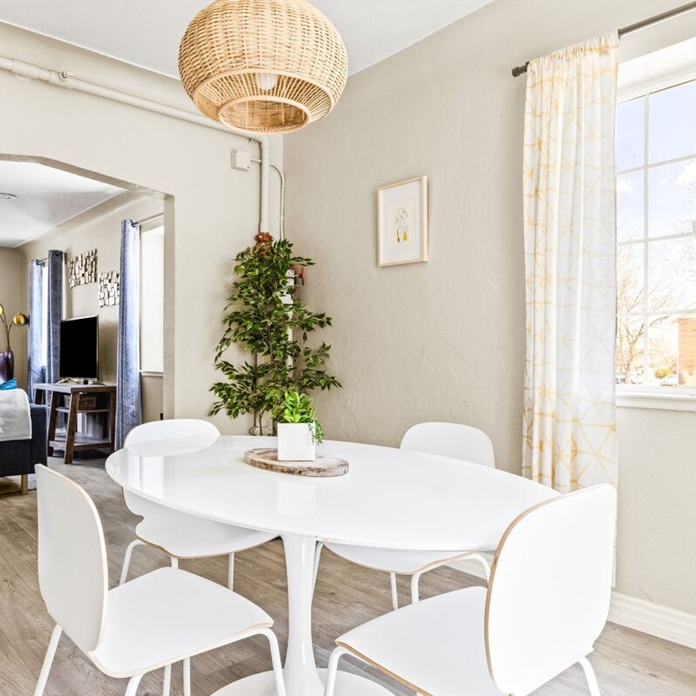The dining table seats 4