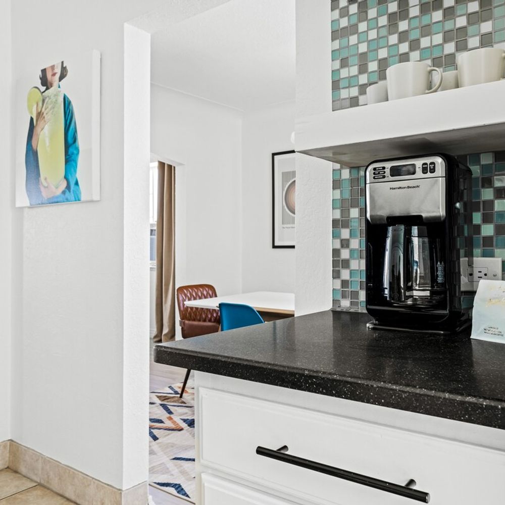 Kitchen opens to dining area