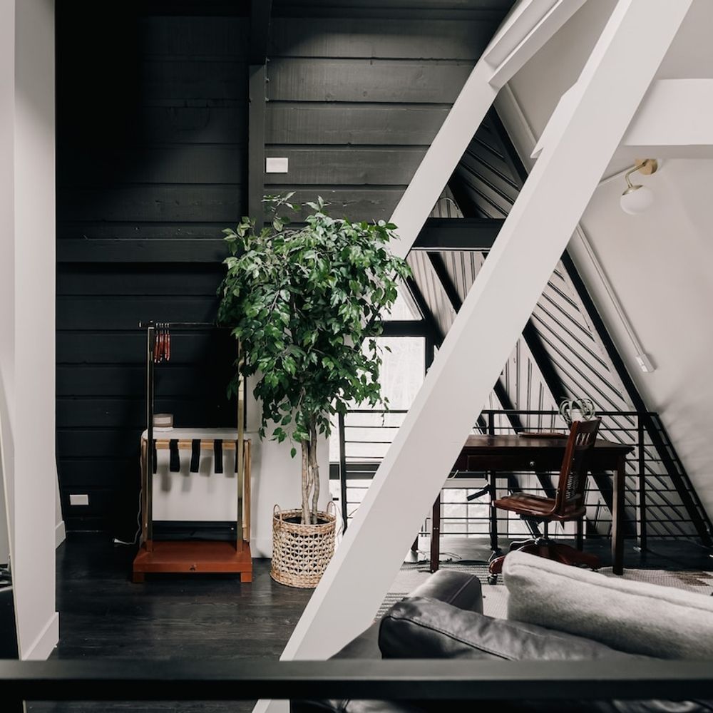 Loft area with seating area and desk