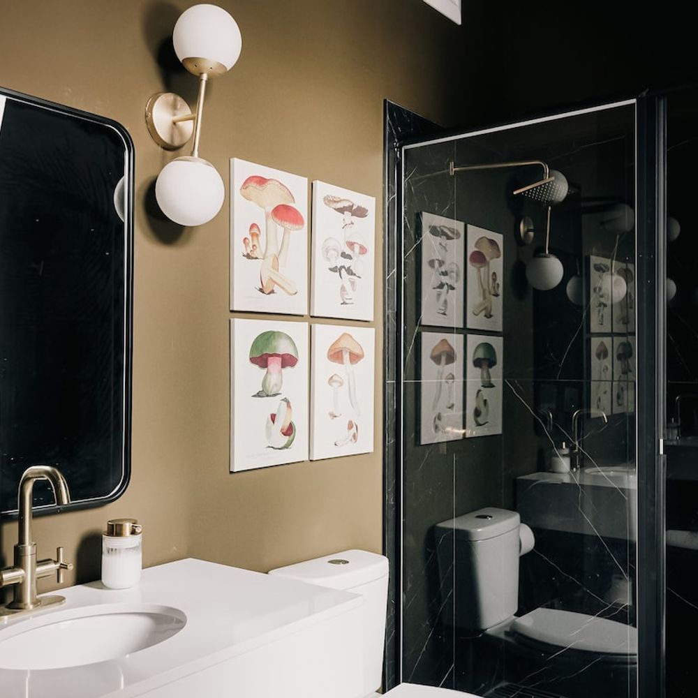 Primary en suite bathroom has a large walk-in glass shower