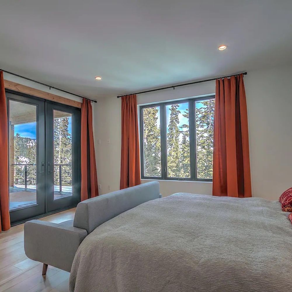 Primary bedroom with deck/hot tub access