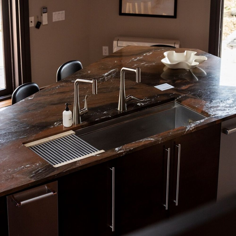 Two faucets at the sink