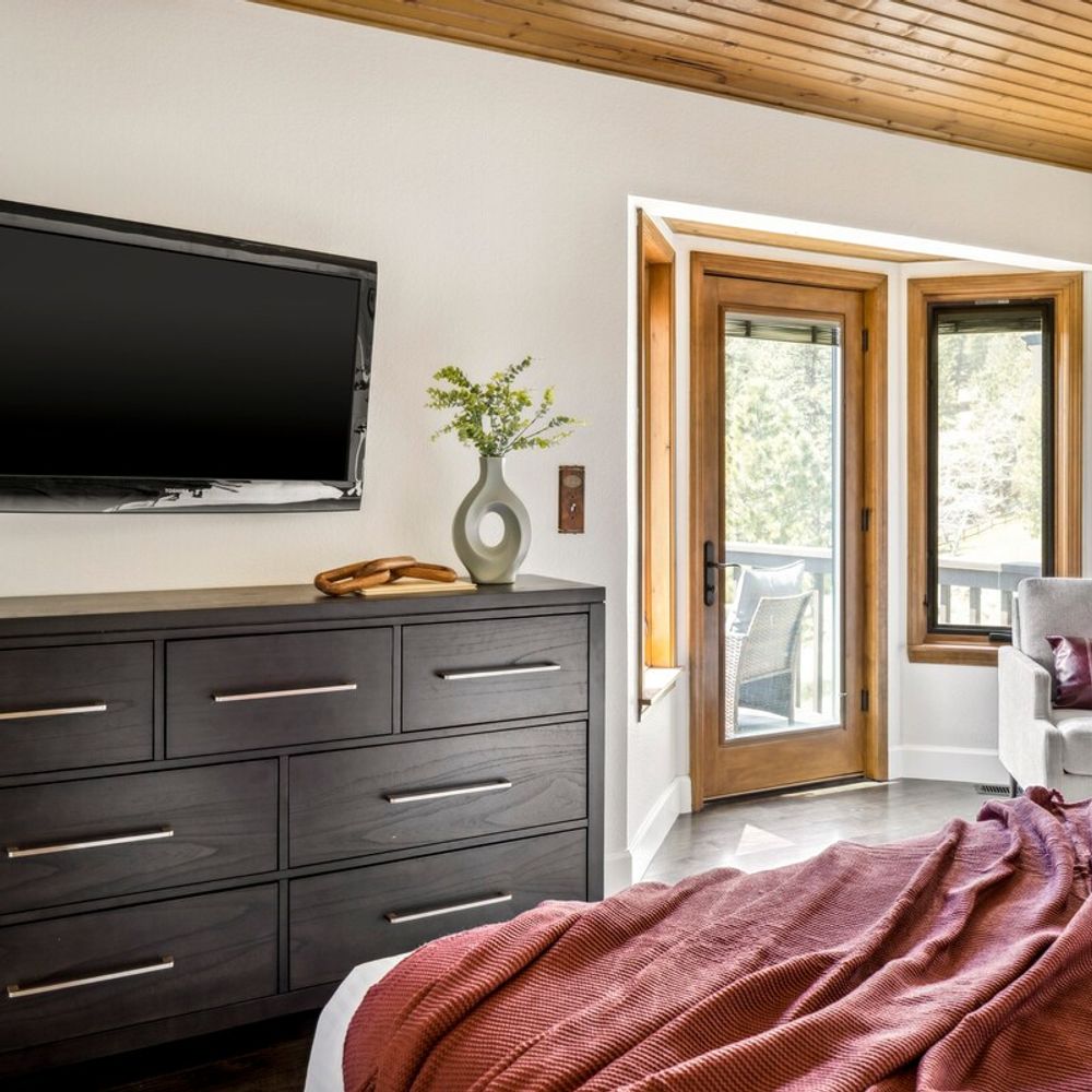 Primary bedroom with private balcony