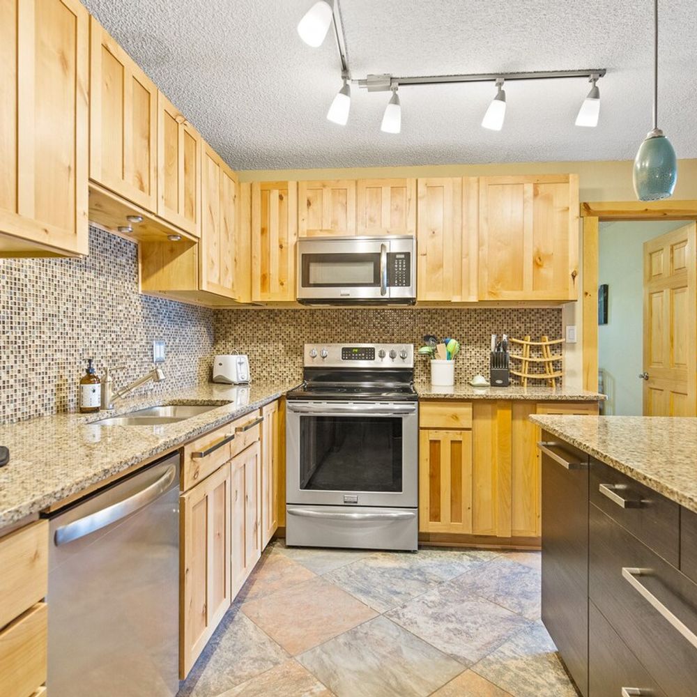 Kitchen with all stainless steel appliances