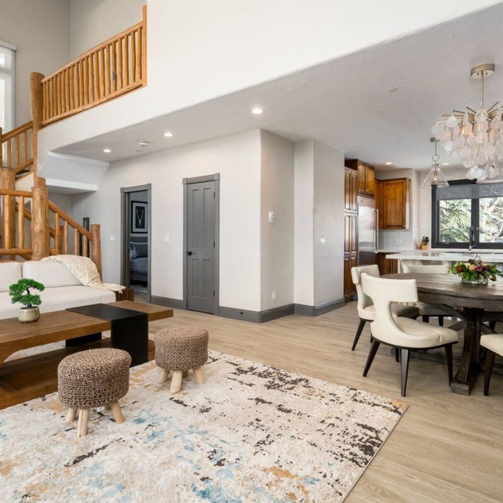Living area leads to dining area and kitchen
