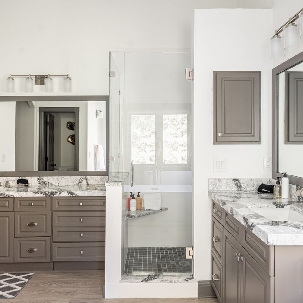 Bedroom 1 en suite bathroom with walk-in glass shower