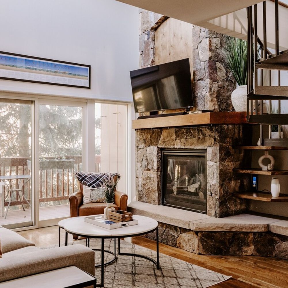 Living room with gas fireplace and Smart TV