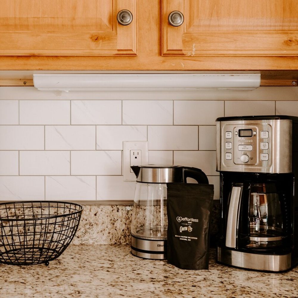 Coffee maker with coffee provided