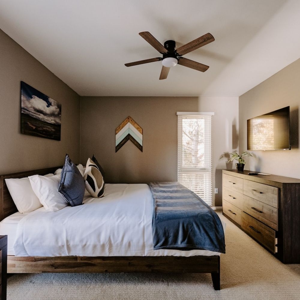 Bedroom 1 with king bed and en suite bathroom