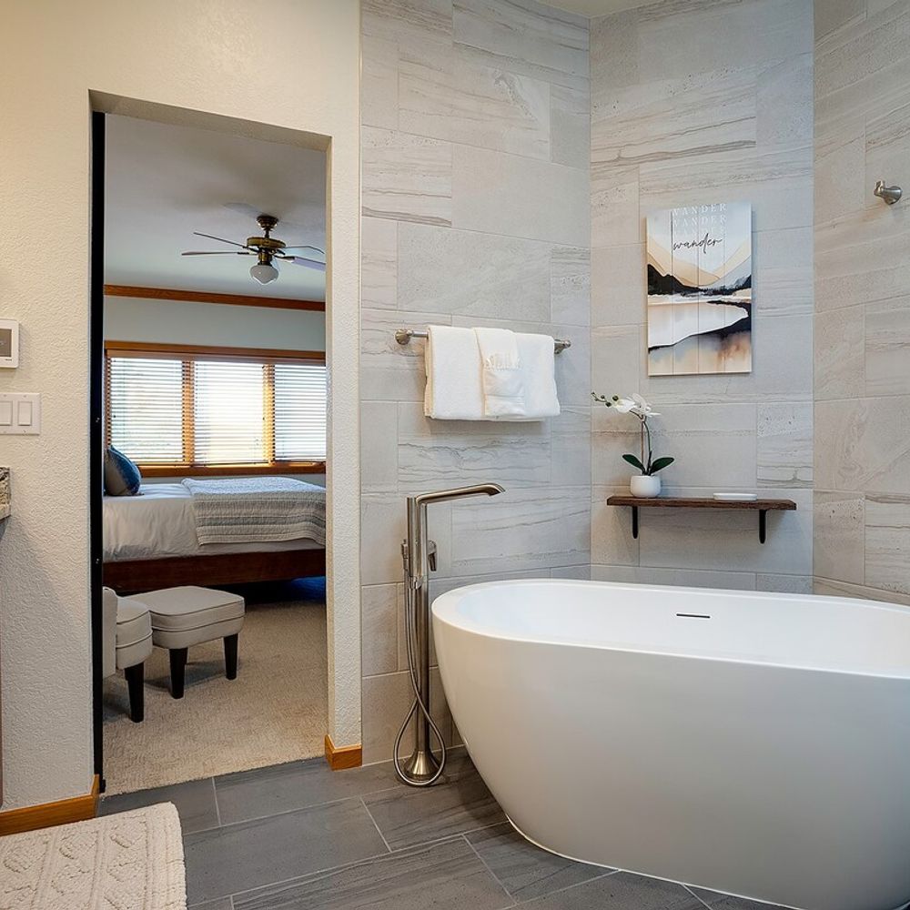 Soaking tub in bedroom 1's en suite bathroom
