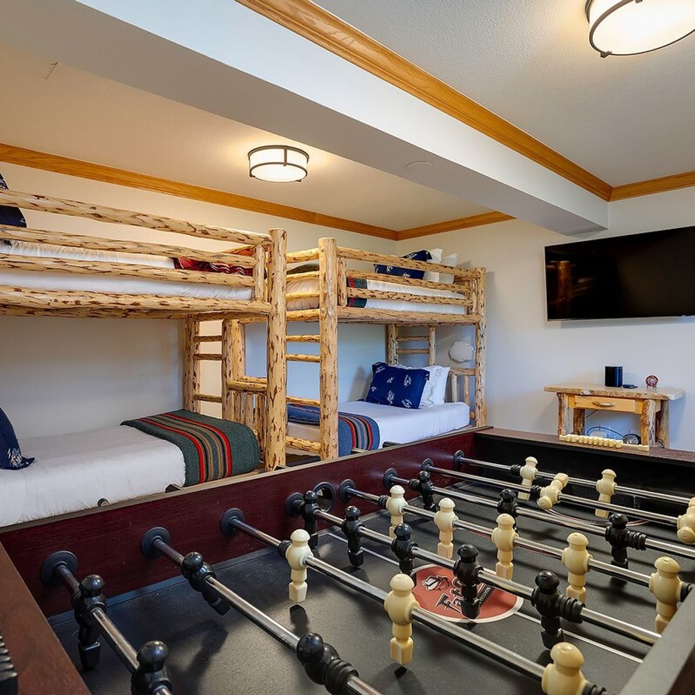 Bunk room with foosball