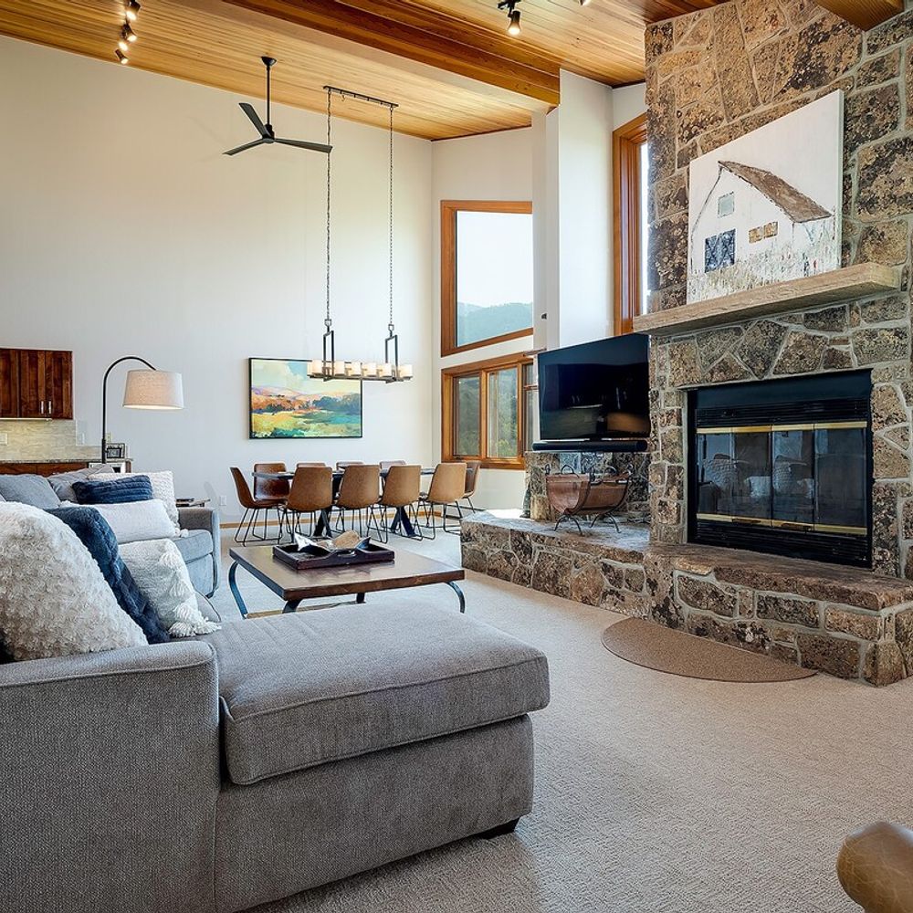Living and dining areas - The wood fireplace is not available for guest use.
