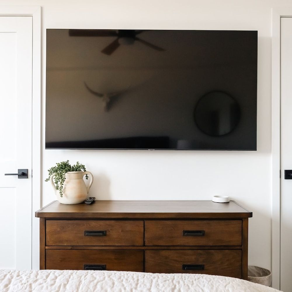 Primary bedroom with flatscreen TV