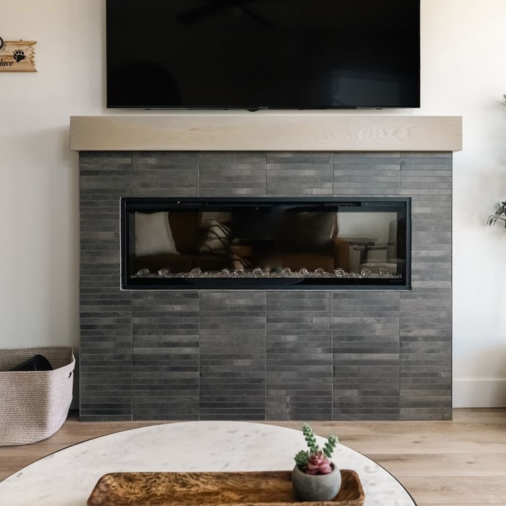 Living area with fireplace and flatscreen TV