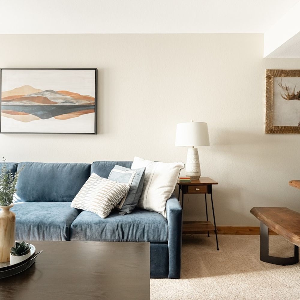 Pullout section of the sofa that converts into a full-size sleeper sofa