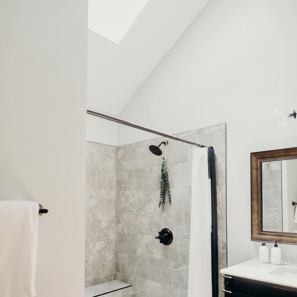 Walk-in shower in full bathroom 2