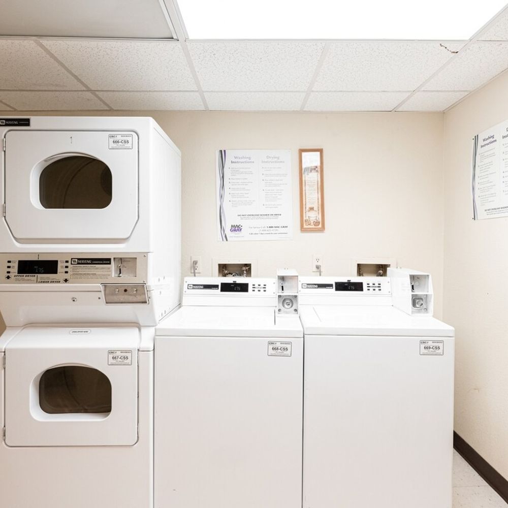 Coin-operated laundry unit available in the complex