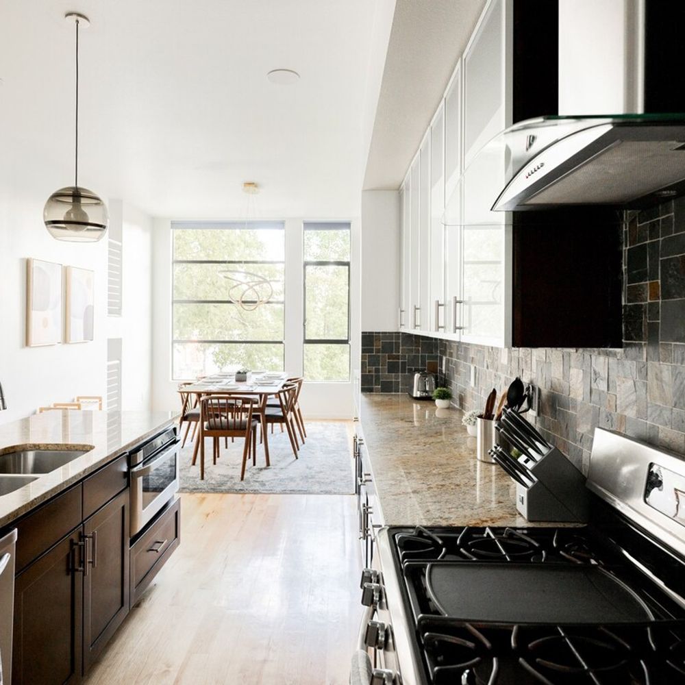 Never miss a minute of the dining experience with the open kitchen and dining areas