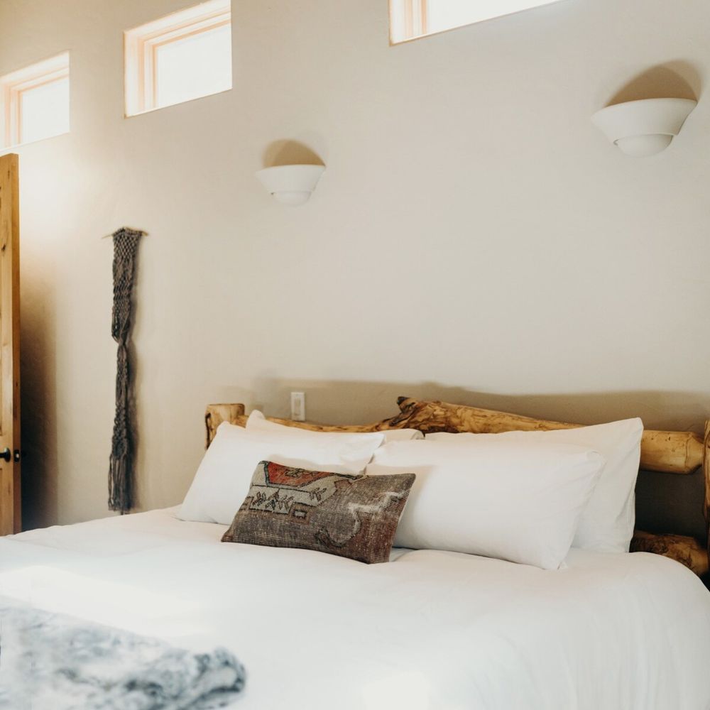 Primary bedroom features a king bed and a full ensuite bathroom