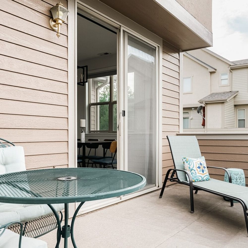 Balcony on main level with table